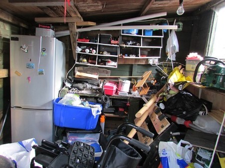 cluttered garage prior to decluttering