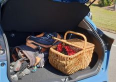 Golf clubs and picnic basket both fit easily in the Toyota Yaris Cross