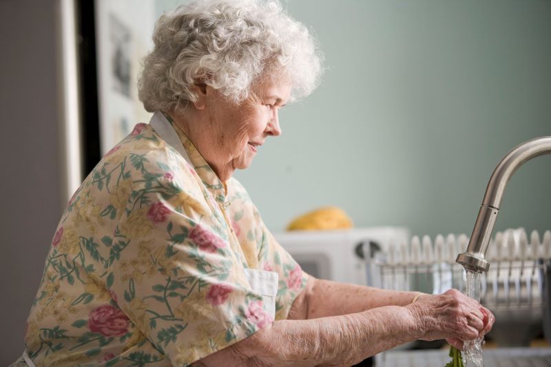 A woman who is ageing at home with the help of a home care package