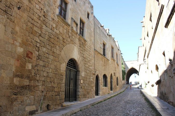 A street scene within the walled City of Old Rhodes, cobbled streets and ancient stone buildings