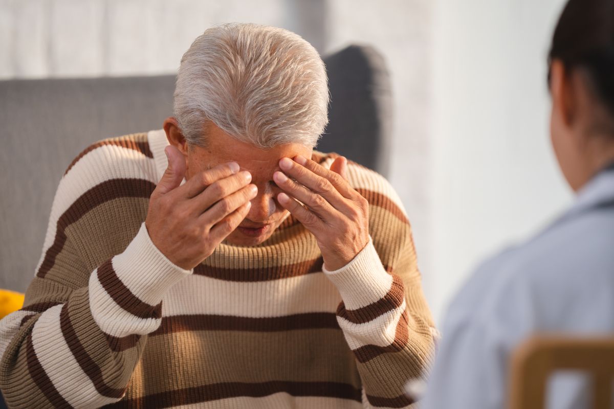 Old man experiencing mental health problems